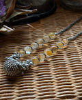 Golden Flower Quartz Bracelet with Tribal Silver Charm
